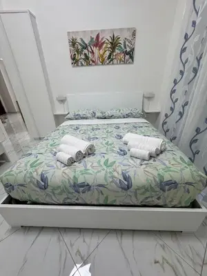 Letto o letti in una camera di Residenza Castel Capuano