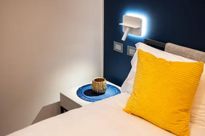 Letto o letti in una camera di Plebiscito Luxury Guest House