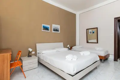 Letto o letti in una camera di Just a Perfect Stay By Dimorra