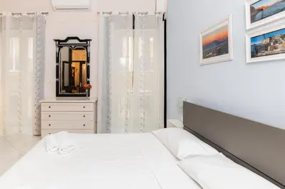 Letto o letti in una camera di Just a Perfect Stay By Dimorra