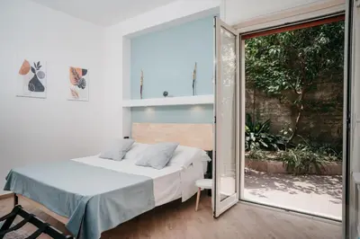 Letto o letti in una camera di CasaNapoletana Charme&Garden Al Corso