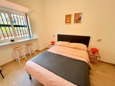 Letto o letti in una camera di A casa di Luca Napoli