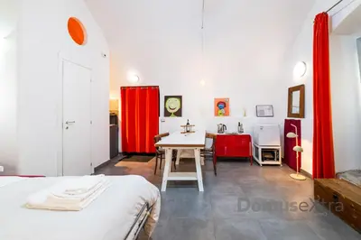 Letto o letti in una camera di Gatto Giallo a Chiaia By DomusExtra