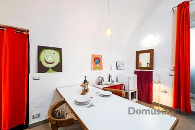 Letto o letti in una camera di Gatto Giallo a Chiaia By DomusExtra