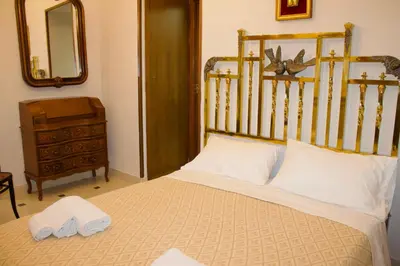 Letto o letti in una camera di L angolo di Dante