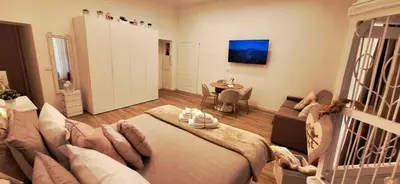 TV o dispositivi per l'intrattenimento presso L'AMI Chiaia Suite