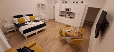 TV o dispositivi per l'intrattenimento presso L'AMI Chiaia Suite
