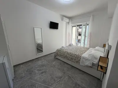Letto o letti in una camera di Napoli Mood Rooms