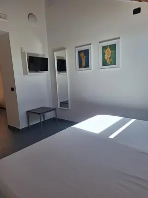 Letto o letti in una camera di Carafa Suite - Plus - Plus II