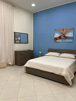 Letto o letti in una camera di a Casa di Nonna