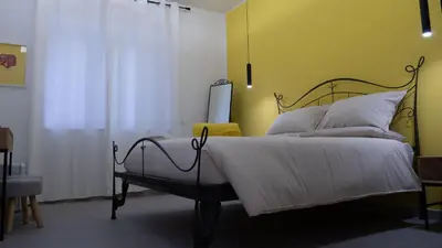 Letto o letti in una camera di Il Golfo di Pulcinella