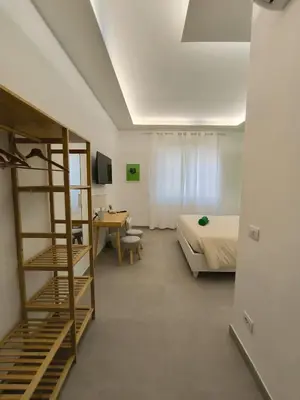 Letto o letti in una camera di Il Golfo di Pulcinella