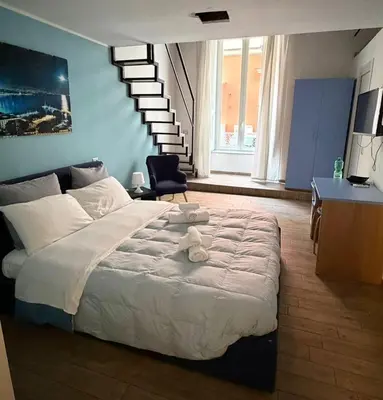 Letto o letti in una camera di Home Salvator Rosa