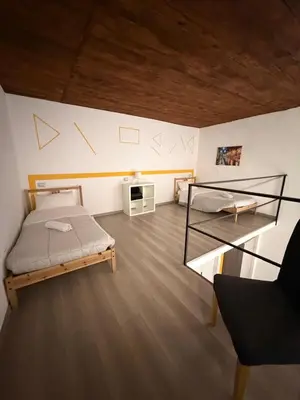 Letto o letti in una camera di Home Salvator Rosa