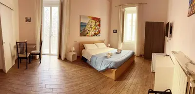 Letto o letti in una camera di Home Salvator Rosa