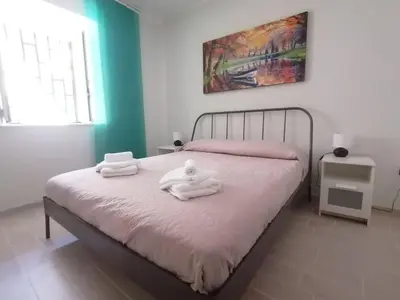 Letto o letti in una camera di Il terrazzino - entire apartment in Vomero