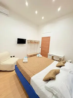 Letto o letti in una camera di Duomo Luxury House