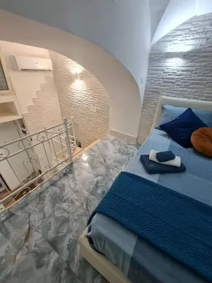 Letto o letti in una camera di Plebiscito house boutique