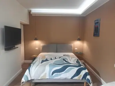 Letto o letti in una camera di Napoli centro storico casa viscardi 2