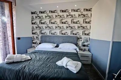 Letto o letti in una camera di BeB Napoli la perla