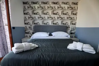 Letto o letti in una camera di BeB Napoli la perla