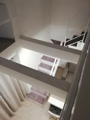 Letto o letti in una camera di MarcoHomeChiaia