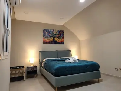 Letto o letti in una camera di Casa Emi- Palazzo Imperiale D'Afflitto