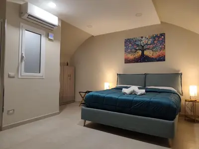 Letto o letti in una camera di Casa Emi- Palazzo Imperiale D'Afflitto