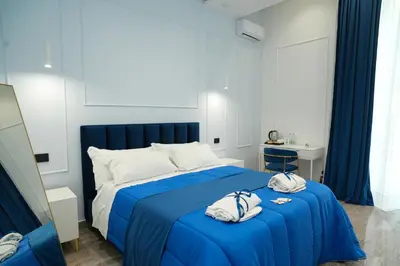 Letto o letti in una camera di Residenza Laezza