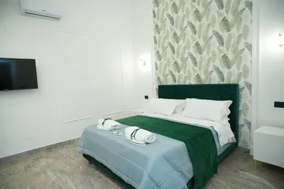 Letto o letti in una camera di Residenza Laezza