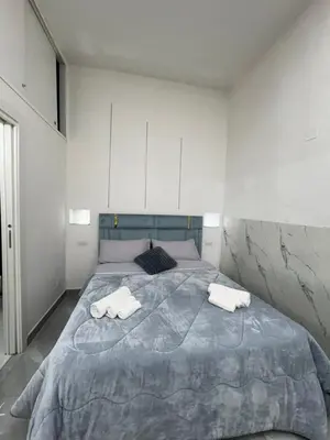 Letto o letti in una camera di Casa robe`