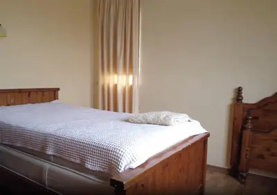 Letto o letti in una camera di Casa del Bosco