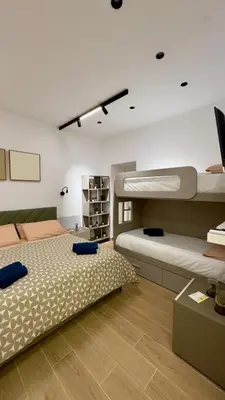 Letto o letti in una camera di Vicolo Vivo Home