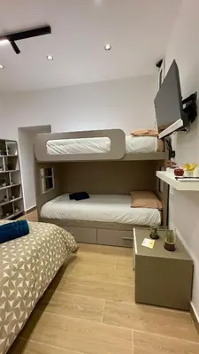 Letto o letti in una camera di Vicolo Vivo Home