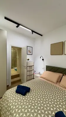 Letto o letti in una camera di Vicolo Vivo Home
