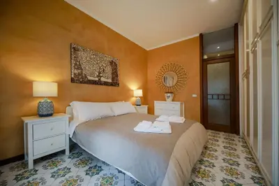 Letto o letti in una camera di Casa Ciuciu Napoli
