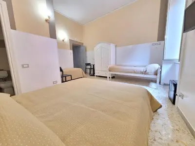 Letto o letti in una camera di Lenny House