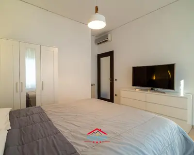Letto o letti in una camera di Suite Stellata Napoli home in the center