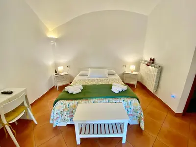 Letto o letti in una camera di Borgo Belvedere