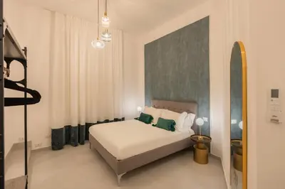 Letto o letti in una camera di VISI di NAPOLI