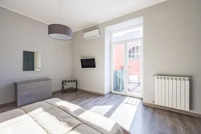 Letto o letti in una camera di Casa Mavi by NapoliApartments