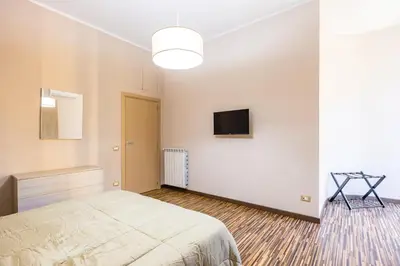 Letto o letti in una camera di Casa Mavi by NapoliApartments
