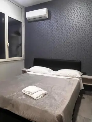 Letto o letti in una camera di Hotels Int&rnational Napoli