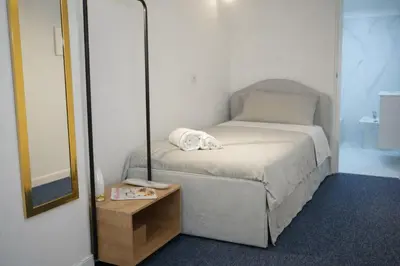 Letto o letti in una camera di Napul'è Riviera