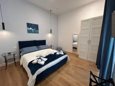 Letto o letti in una camera di Naples Guest House - Arenella