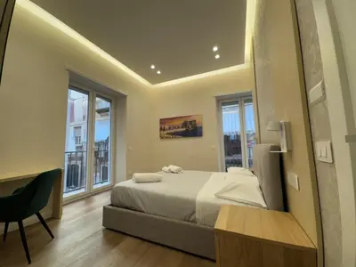 Letto o letti in una camera di Maison Napoli Centrale