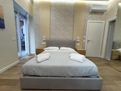 Letto o letti in una camera di Maison Napoli Centrale