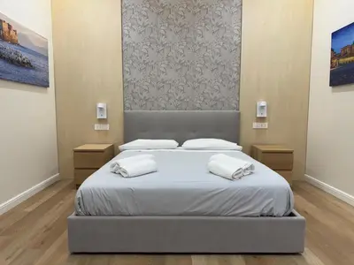 Letto o letti in una camera di Maison Napoli Centrale