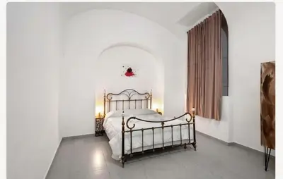 Letto o letti in una camera di Mamma Napoli home