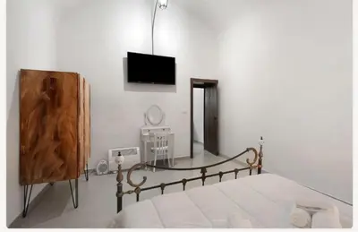 Letto o letti in una camera di Mamma Napoli home